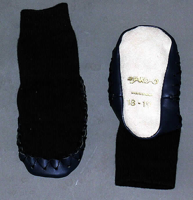 Giày, dép có đế ngoài bằng da thuộc hoặc da tổng hợp